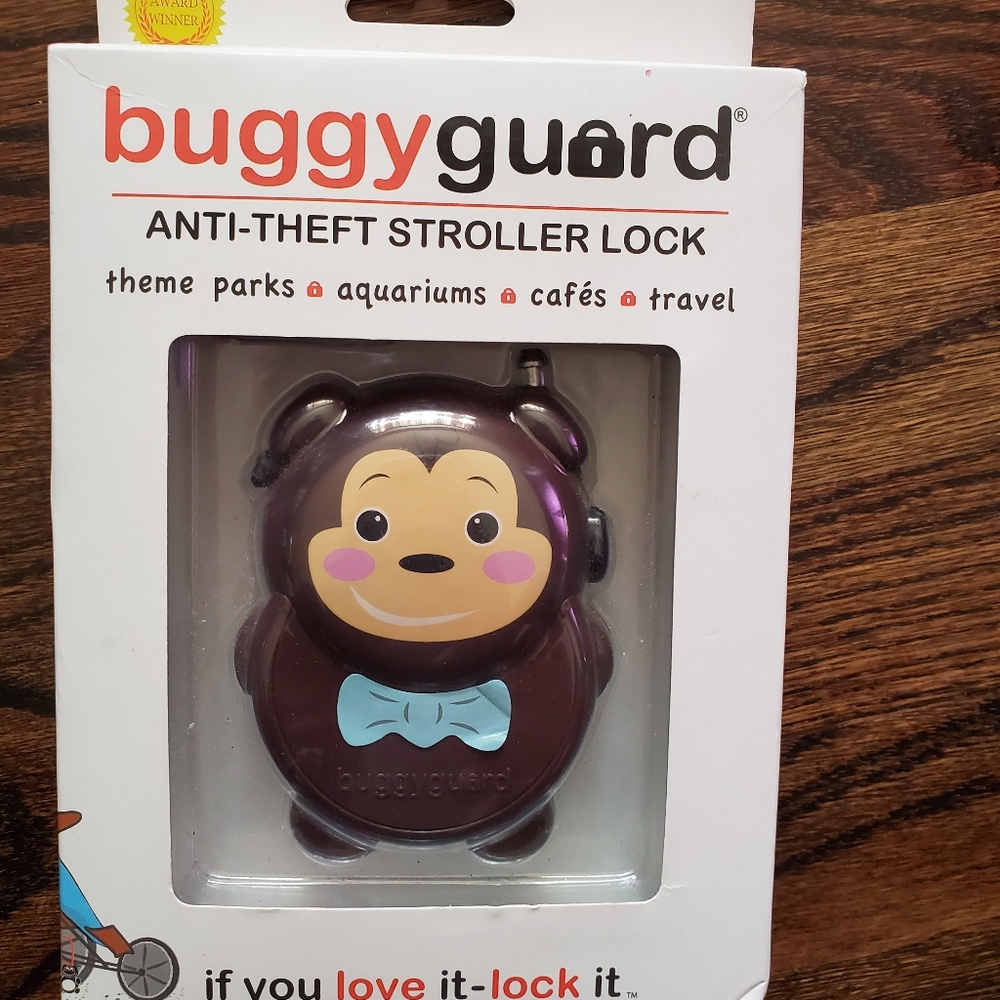 Buggy guard stroller lock